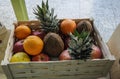 A crate full of organically grown fruits on display