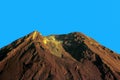 The crater of Mount Semeru under the blue sky.