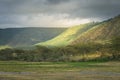 Crater slopes and wildlife meadow of Ngorongoro Conservation Area. Safari concept. Tanzania. Africa Royalty Free Stock Photo