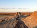 Craters of mud volcanoes in the background of the red semi-desert. Kilakupra Mud Volcanoes, Vashlovani, Georgia Royalty Free Stock Photo