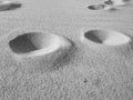 Craters on the sand on the beach