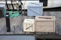 Crates on the deck of a wooden boardwalk Royalty Free Stock Photo