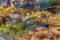 Crates filled with locally grown fresh produce line the shelves of the community farmers market Royalty Free Stock Photo