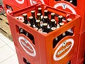 Crates of villacher beer bottles ready for distribution in store Royalty Free Stock Photo