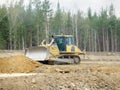 Crawler bulldozer on the construction of the highway Royalty Free Stock Photo