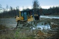 Crawler bulldozer on the construction of the highway Royalty Free Stock Photo