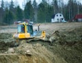 Crawler bulldozer on the construction of the highway Royalty Free Stock Photo