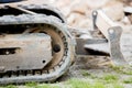 The Crawler close up , muddy crawler chain detail in earthy ambiance