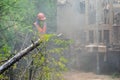 The crawler drilling rig drills well, there is a lot of dust when drilling a well. Drilling of exploration wells in the forest