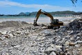 Crawler excavator on the beach