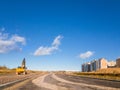 Crawler excavator with bucket, construction road Royalty Free Stock Photo