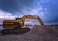 Crawler excavator during earthmoving works on construction site Royalty Free Stock Photo