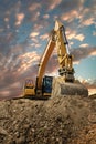 Crawler excavator during earthmoving works on construction site Royalty Free Stock Photo