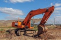 Crawler excavator front view. Special equipment for construction. Powerful unit