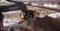 Crawler excavator working at the construction site. Construction machinery for excavating, loading, lifting and hauling