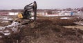 Crawler excavator working at the construction site. Construction machinery for excavating, loading, lifting and hauling