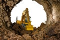 Crawler excavator yellow in the tunnel