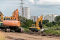 Crawler excavators dig the earth with a bucket.