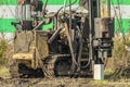 Crawler mobile diesel pile hammer working on construction site