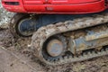 Crawler tracks of a small excavator Royalty Free Stock Photo