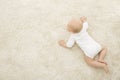 Crawling Baby on Carpet Background, Infant Kid Top View, Newborn Royalty Free Stock Photo