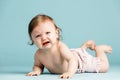 Crawling baby girl crying on the floor. Royalty Free Stock Photo