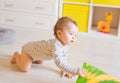 Crawling funny baby boy indoors at home Royalty Free Stock Photo