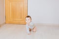 Crawling funny baby boy indoors at home Royalty Free Stock Photo