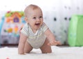 Crawling funny baby boy indoors at home Royalty Free Stock Photo