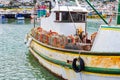 Crayfish Crab boat floating in Kalk Bay Harbour, Cape Town