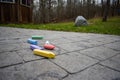 Crayola Brand Chalk Scattered on a Sidewalk Royalty Free Stock Photo