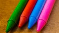 Crayon tips close-up. Shallow depth of field for dreamy impressional feel. Rainbow crayons