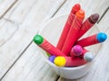 Crayons in plastic glass Royalty Free Stock Photo