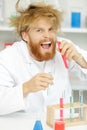 Crazy alchemist checks test tubes