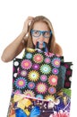 Crazy amusing confused girl with shopping gift bags. Royalty Free Stock Photo