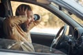 Crazy Angry Man Annoyed While Driving a Car. Mad Agrressive Driver Screaming Irritated with Traffic Royalty Free Stock Photo