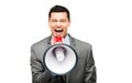 Crazy Asian businessman screaming in megaphone on white background