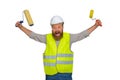 Crazy bearded man construction worker waving rollers and at the same time shouting something. White isolated background.