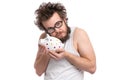 Crazy bearded man with piggy bank Royalty Free Stock Photo