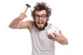 Crazy bearded man with piggy bank Royalty Free Stock Photo