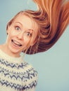 Crazy blonde woman with windblown blonde hair Royalty Free Stock Photo