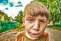 Crazy boy looking into the camera on the street close-up wide-angle plan, XDR photo Royalty Free Stock Photo