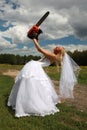 Crazy bride with red chainsaw