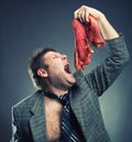 Crazy businessman with meat