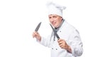 Crazy chef threatening two knifes Royalty Free Stock Photo