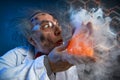 Crazy chemist with test-tube Royalty Free Stock Photo