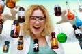 Crazy chemist woman with chemical glassware flask Royalty Free Stock Photo