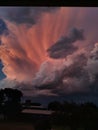 Crazy clouds forming in the sky. The sun giving the last bit of color for the day. Royalty Free Stock Photo
