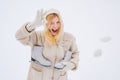 Crazy comical face show OK. Love winter. Funny smiling Winter woman portrait outdoor. Beauty Joyful Model Girl laughing