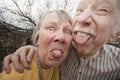 Crazy Couple Sticking Out Tongues Royalty Free Stock Photo